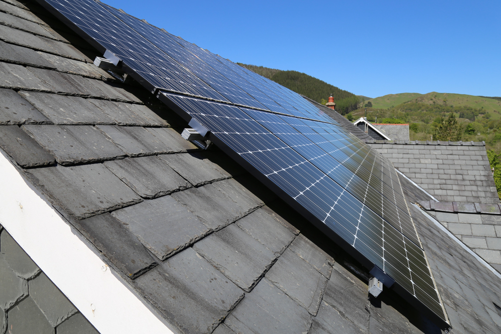 Domestic solar panels fixed to a slate roof