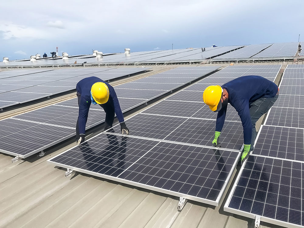 Solar Panels being installed on a commercial building