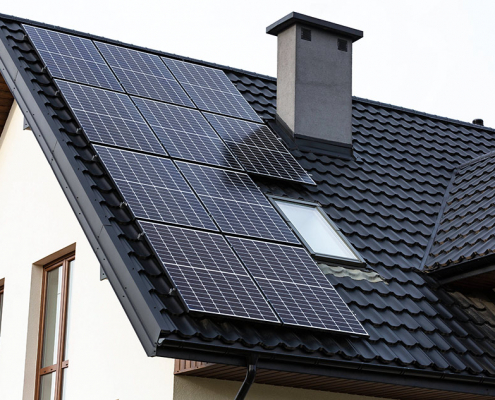 Tile effect roof sheets with solar panels Tile effect roof sheets with solar panels installed